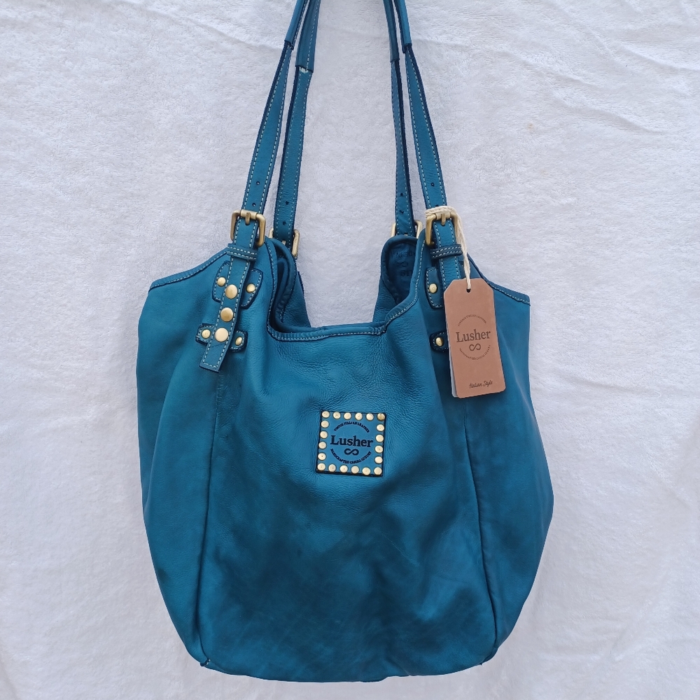Lusher Hobo Bag. New with tag. Color Teal  . 22"w 14"h 5"d 10" handle drop.